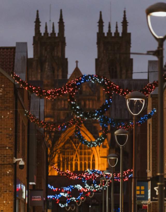 Christmas lights at Flemingate Shopping Centre with Beverley Minster in the background