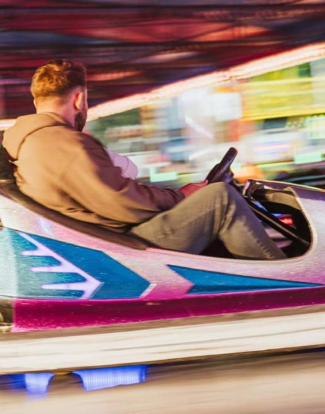 A man on the dodgers, speeding past.