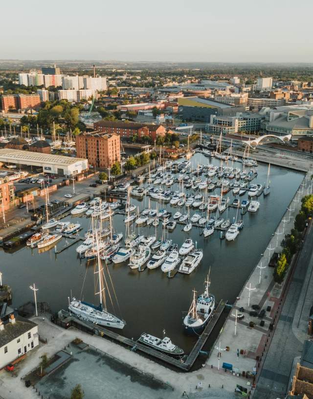 Hull Marina shot from above, showing many boats in the dock at sunset.
