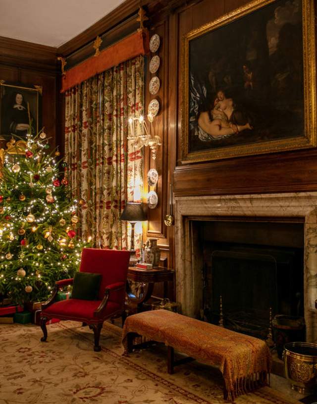A living room at Doddington Hall, decorated with beautiful Christmas decorations