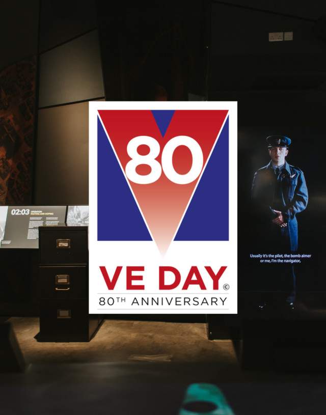A logo that reads VE Day 80 overlaying a WW2 museum exhibition
