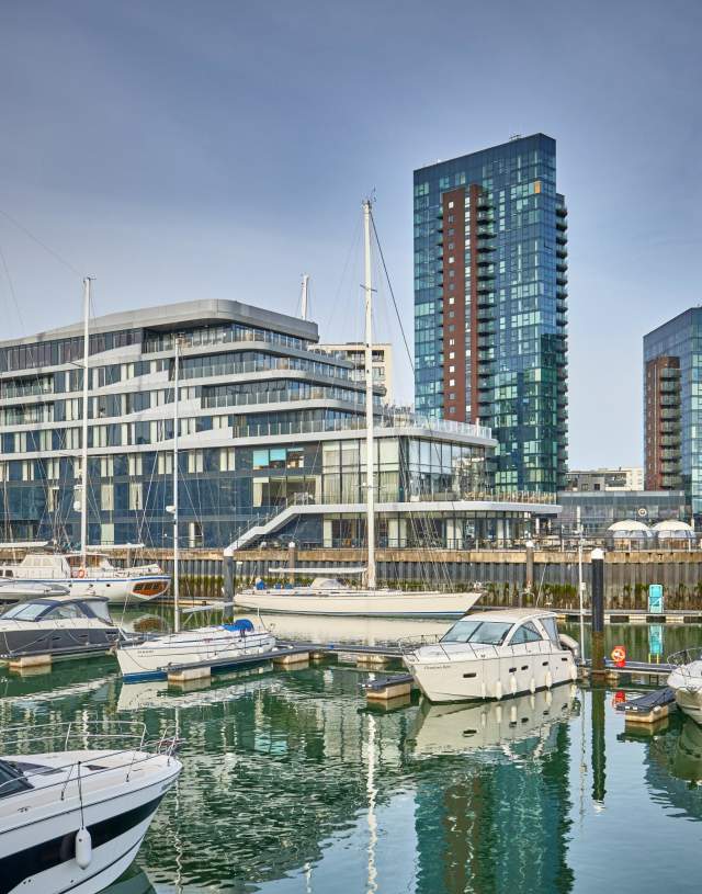 Ocean Village marina showing boats in the foreground and Harbour Hotel in the background which is designed as a super yatch