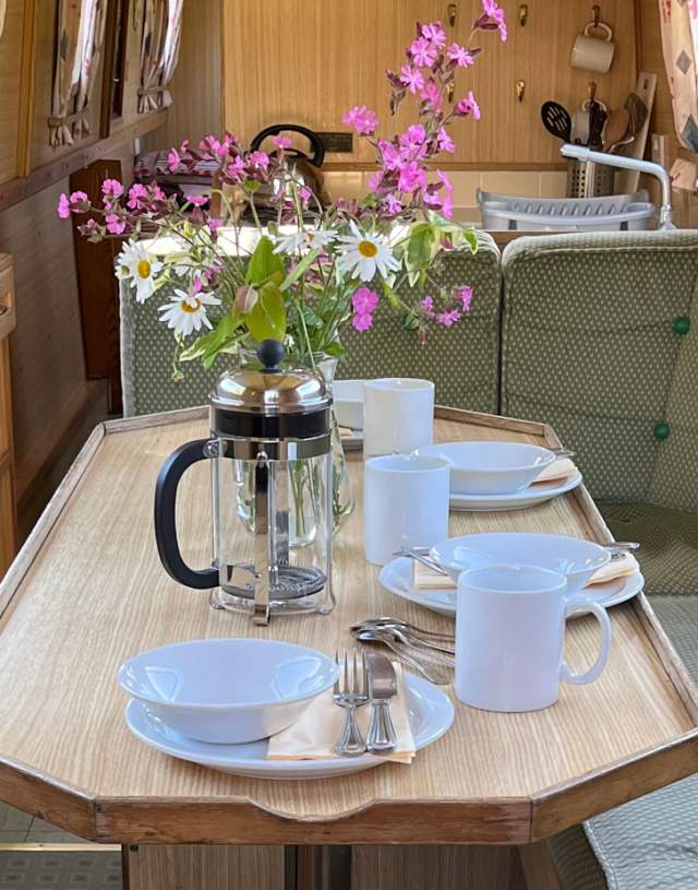 Farncombe Boat House - Narrowboat Holiday Hire - interior of boat showing dining area