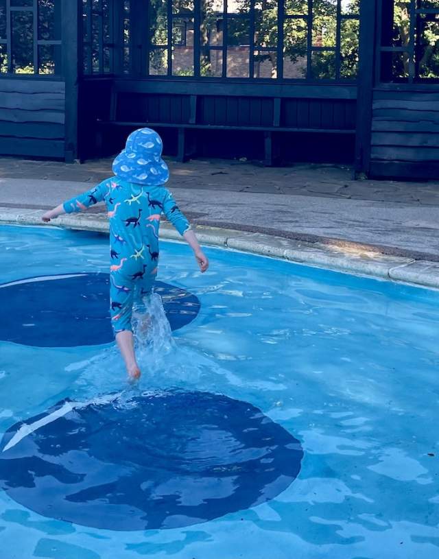 Splashing at Stoke Park Paddling Pool Guildford