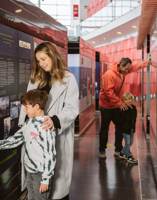 young family exploring the displays in the national waterfront museum