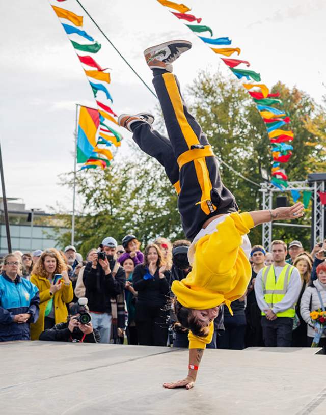A person breakdancing on a stage
