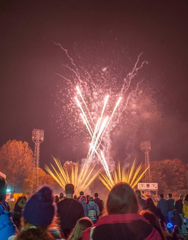 Crowds watching fireworks at st helens ground in Swansea