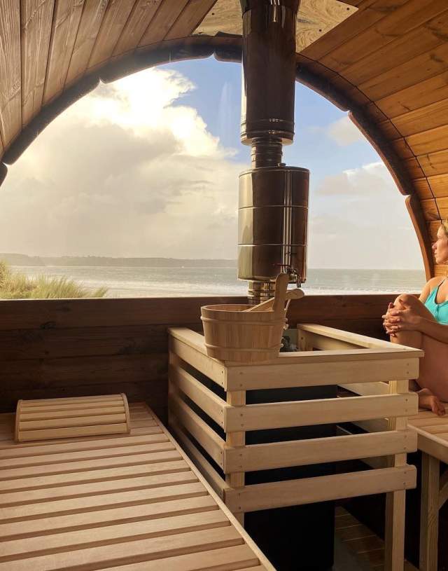 woman relaxing in a sauna at Ty Sawna in oxwich
