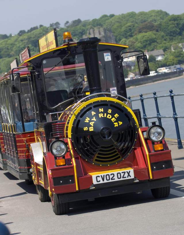 Swansea Bay Rider Land Train running along Swansea Prom