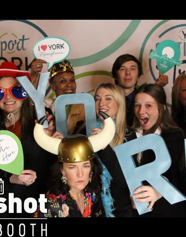 EY staff at ATIE photobooth