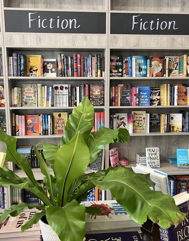 book display behind plants at bound books