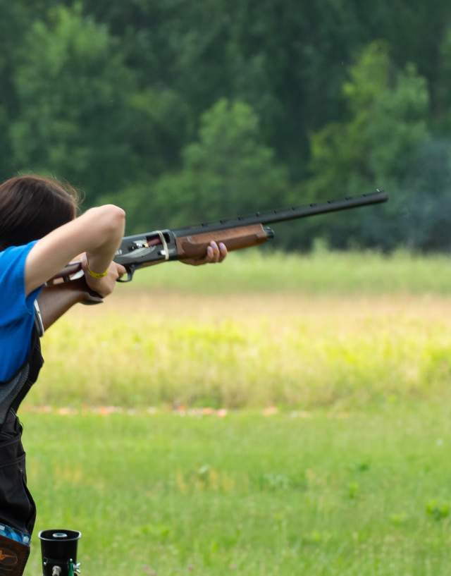 Person shooting a clay target