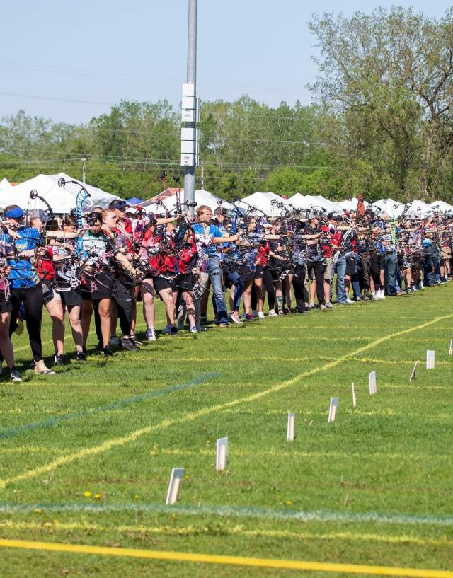 Archers line up at the shot line