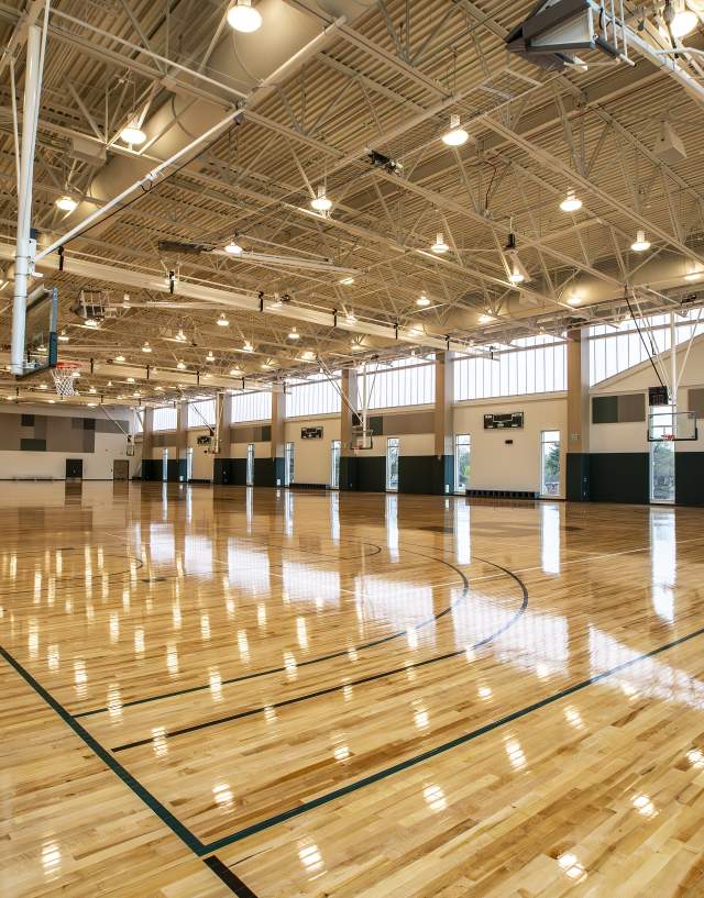 A large, empty gym at the Student Recreation and Wellness Center