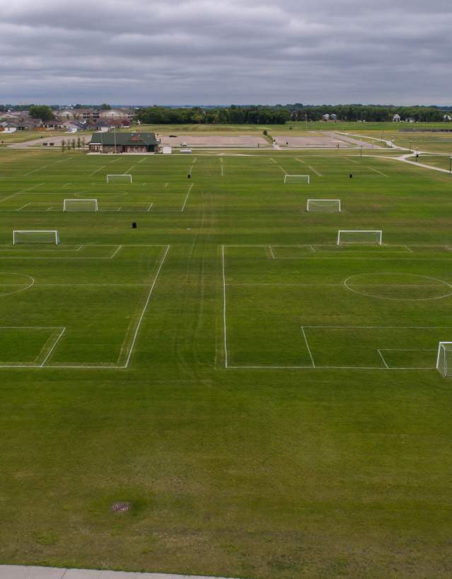 large park set up with multiple soccer goals