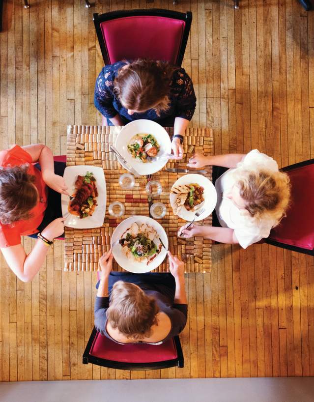 Aerial view of a group of 4 women dining at Firestone's