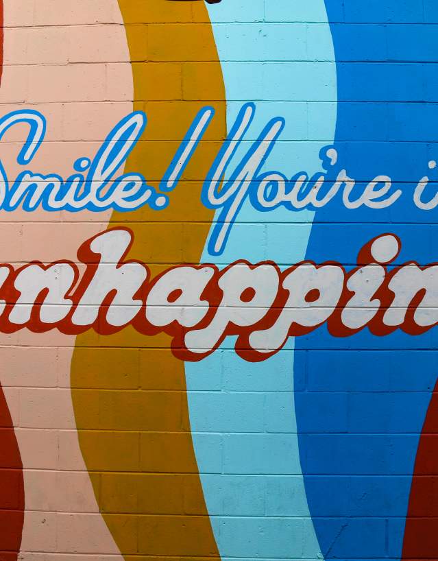 Smile! You're in Manhappiness