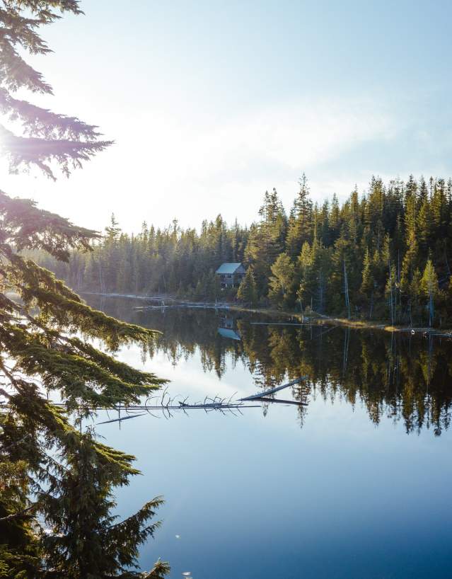 View of the lake and the Elk Lake Hut on the Sunshing Coast Trail.