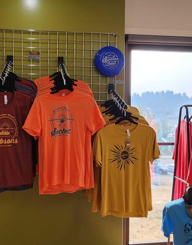 T-shirts and souvenirs inside the Gibsons Visitor Centre.