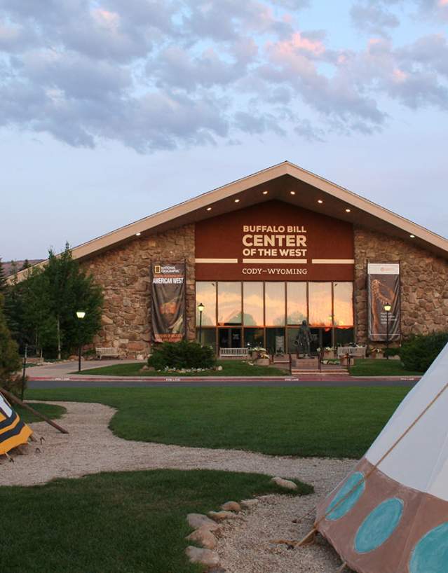 Entrance to the Buffalo Bill Center of the West featuring a bronze statue in Cody, Park County, Wyoming.