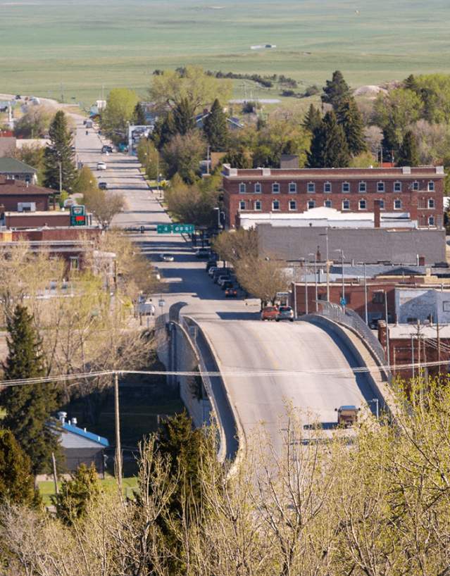 Overhead view of downtown Lusk, Wyoming, showcasing historic buildings and quiet streets in Niobrara County.