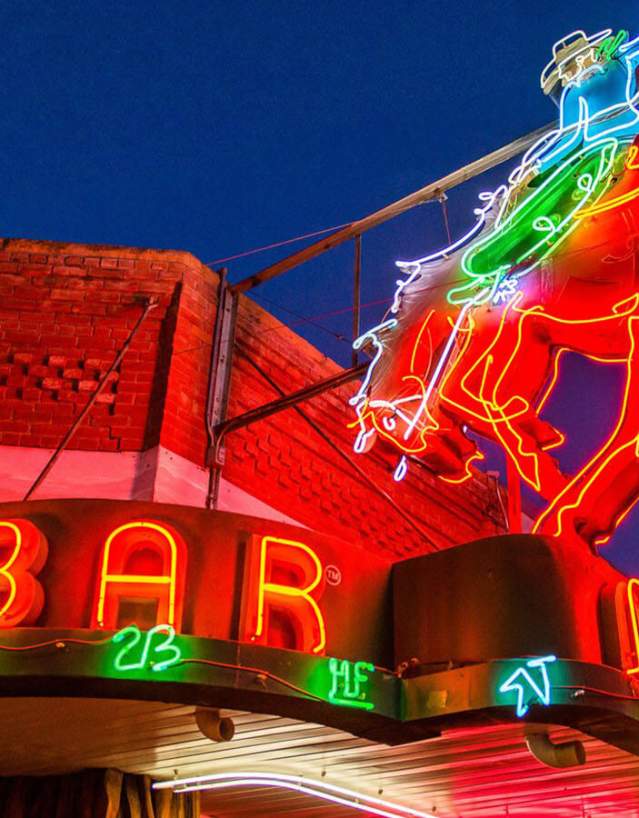 The iconic Mint Bar with its neon sign on Main Street in Sheridan, Sheridan County, Wyoming.
