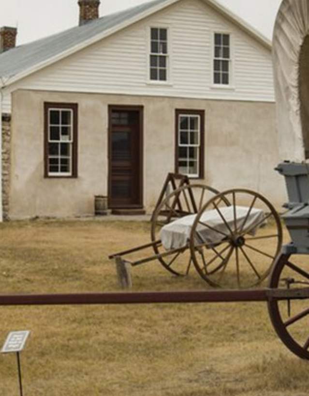 Historic Fort Laramie with wagen and open grasslands in Goshen County, Wyoming.