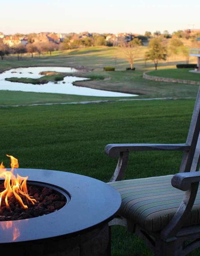 Fire Pit And Chair With An Irving, TX Golf Course In The Background