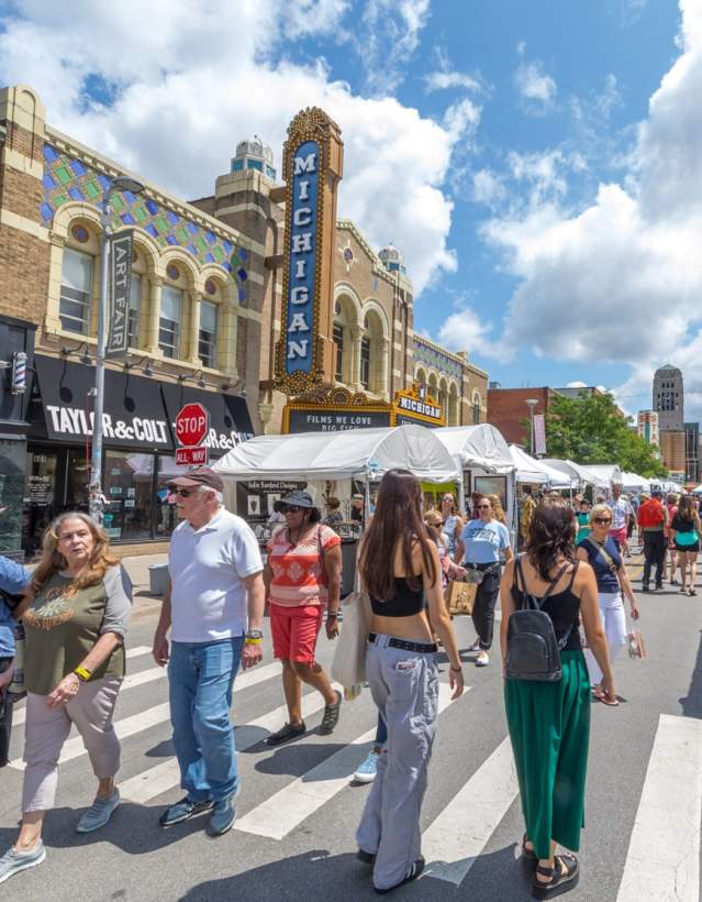 Crowds walking the street at the Ann Arbor Art Fair