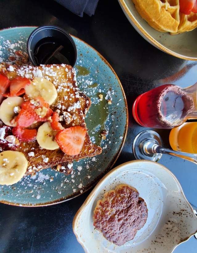 Breakfast of French toast and mimosas
