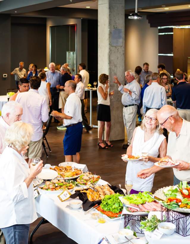 Group enjoying a reception at Zingerman's Greyline