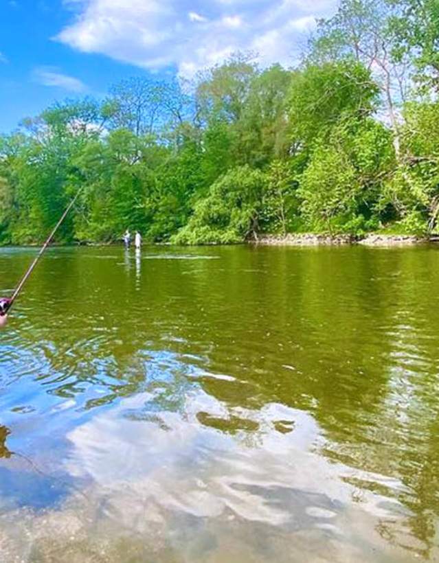 Girl fishing in Huron River