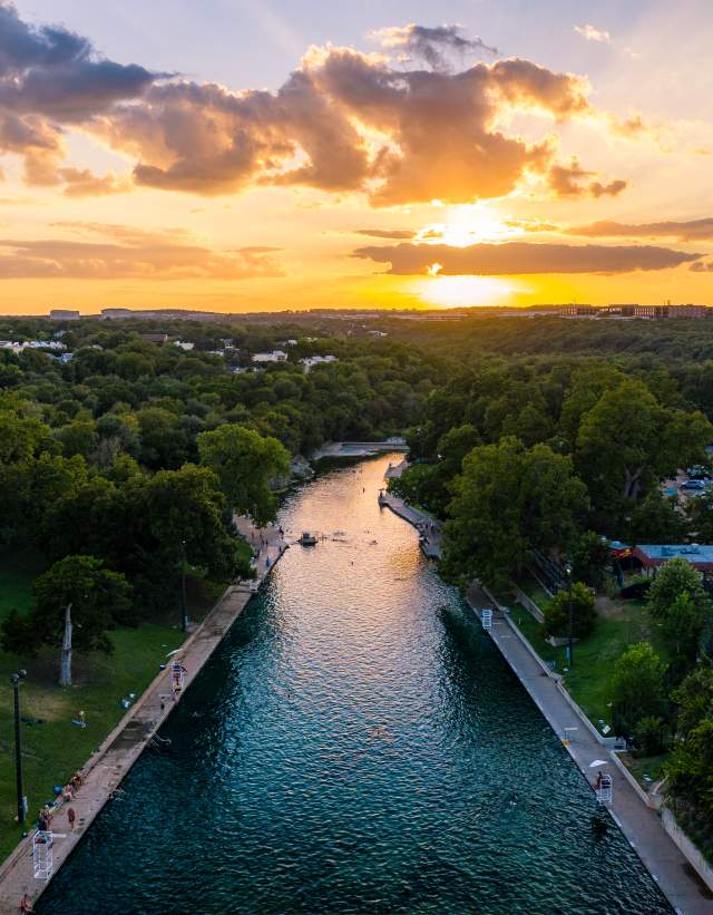 Aerial view of Barton Springs Pool at Sunset in Austin Texas