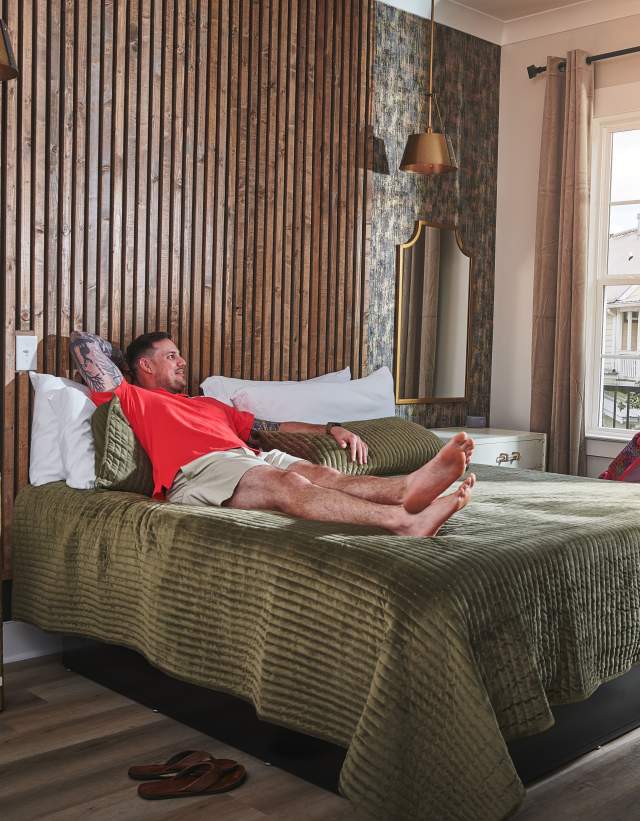 A couple unpacks their suitcase at Buck Creek BnB in Helena, Alabama.