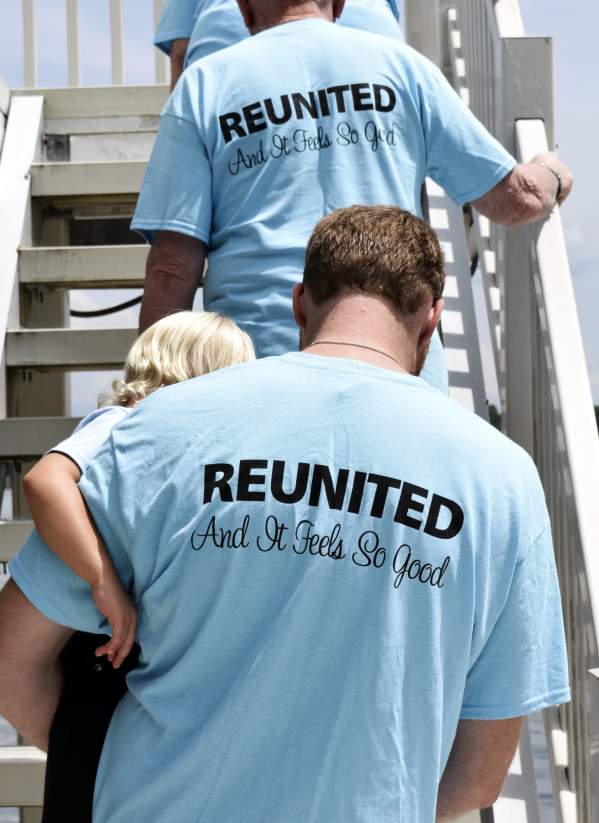 light blue shirts, people walking up the stairs, lakeview