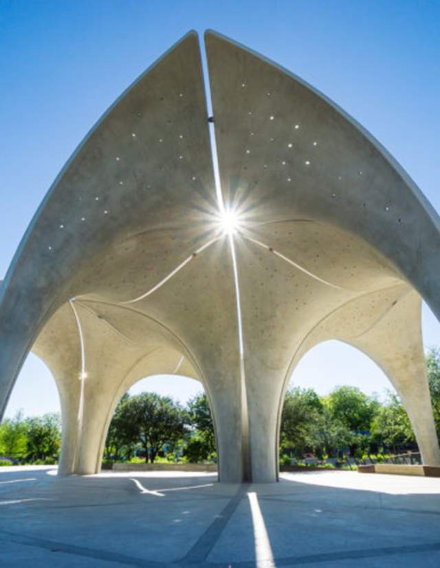 Sun shine shining through structure at Confluence Park.