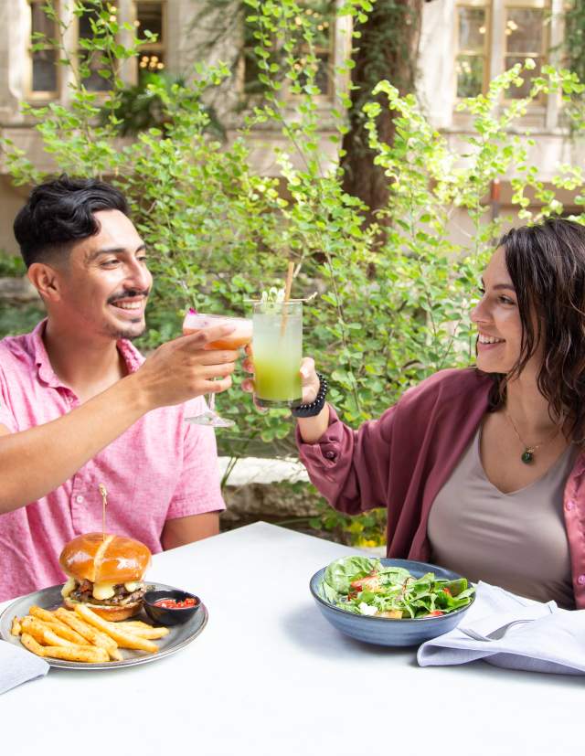 Couple cheers and dines on the San Antonio River Walk