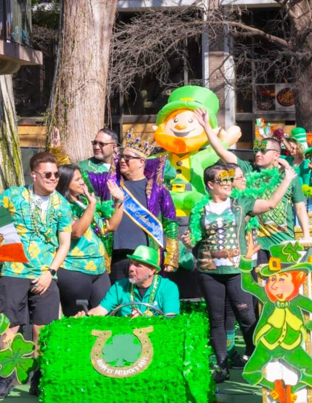 Parade float decorated in green decor for St. Patrick's Day