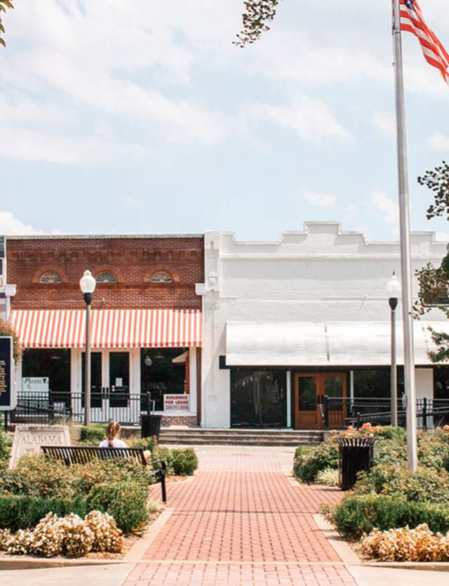 historical market in front of storefronts in Downtown Opelika