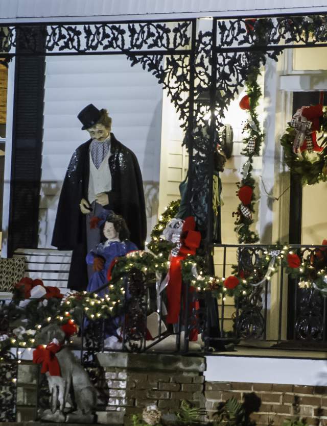 Mr. and Mrs Clause on front porch