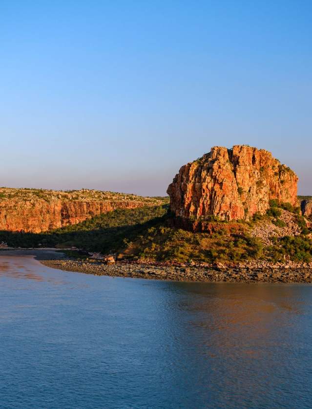 Taken from onboard a Kimberley cruise, the image shows an ancient Kimberley island and rocks
