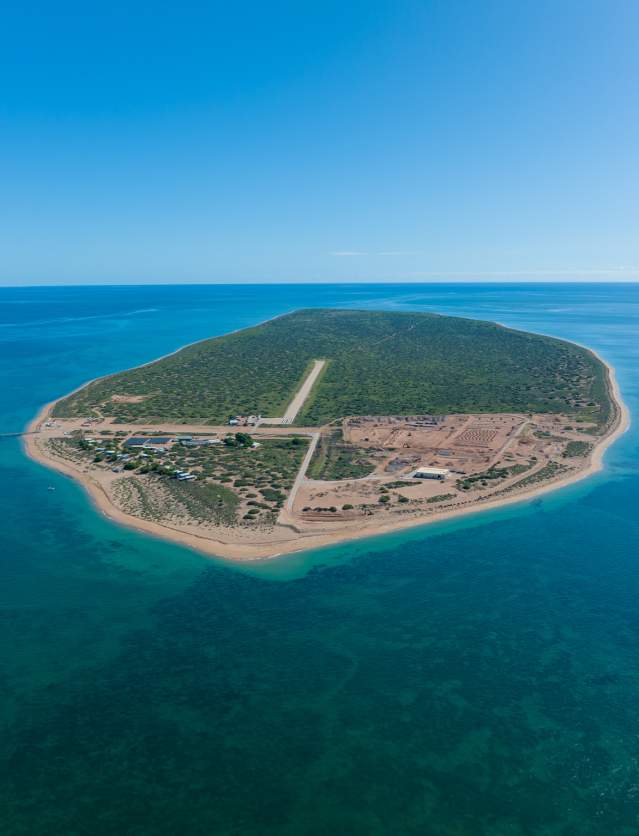 An aerial view of Thevenard Island, one of the Mackerel Islands, showing the airstrip and accommodation in the foreground