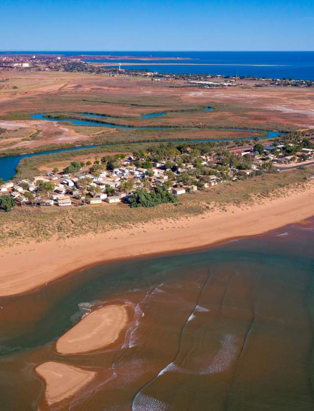 Seen from the air, the foreshore of Port Hedland with the port in the background