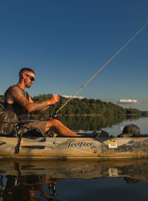 Vincent Stuter of Anglers Anchor in a Kayak Fishing on the River.
