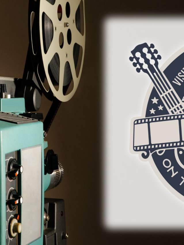 This image features a split view. On the left, a vintage movie projector with reels is displayed against a subtle, dark background. On the right, a vibrant, detailed logo for the "Visit Amarillo Arts Committee" is showcased, incorporating elements like a microphone, guitar, and a film strip, all set within a circular design with decorative motifs, and themed around "On the Silver Screen" and Texas Route 66. The logo is in monochrome and positioned against a light background, linking film technology with artistic celebration.