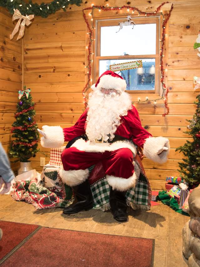 Kid Walking Towards Santa