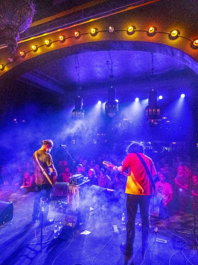 A band playing on stage at the Spanish Ballroom at McMenamins Elks Temple
