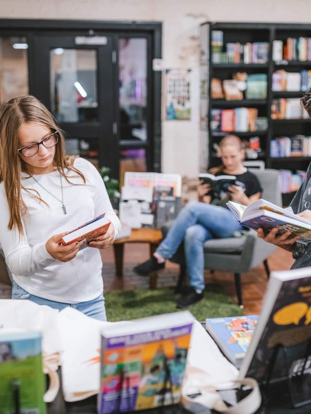 Teens browse books in indie bookstore Bookish in Fort Smith.