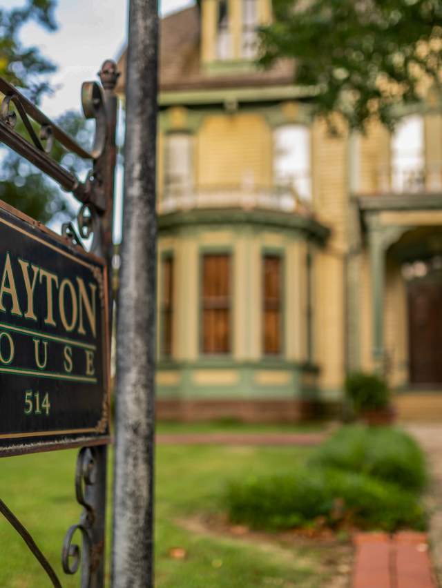 An ornate sign marks the historic Clayton House in Fort Smith, Arkansas.
