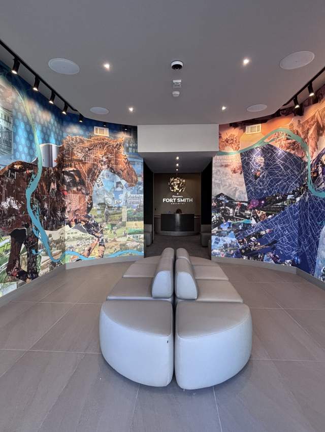 The Fort Smith, Arkansas Visitors Center is decorated with floor-to-ceiling murals composed of historical community photos.